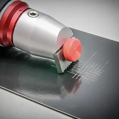 Cross cut test for determining the effectiveness of the plasma treatment on paint bonding